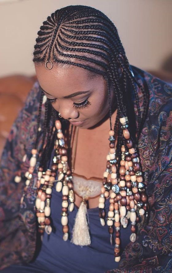 Feed in beaded cornrow braids hairstyle