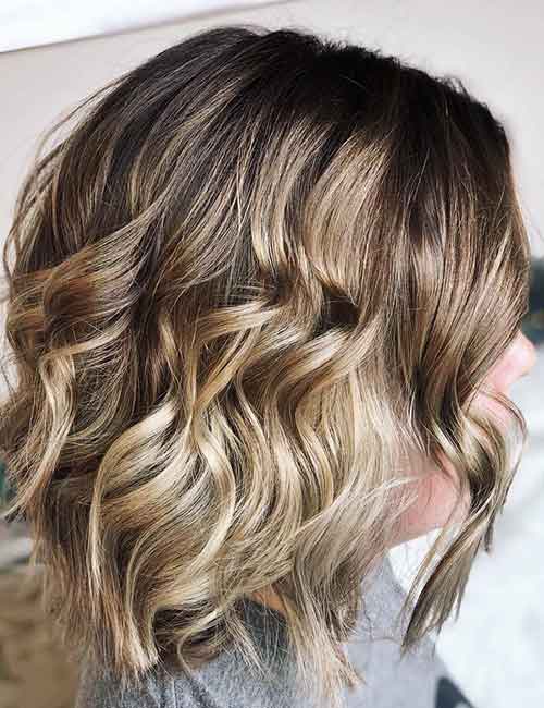 Warm blonde balayage hair color