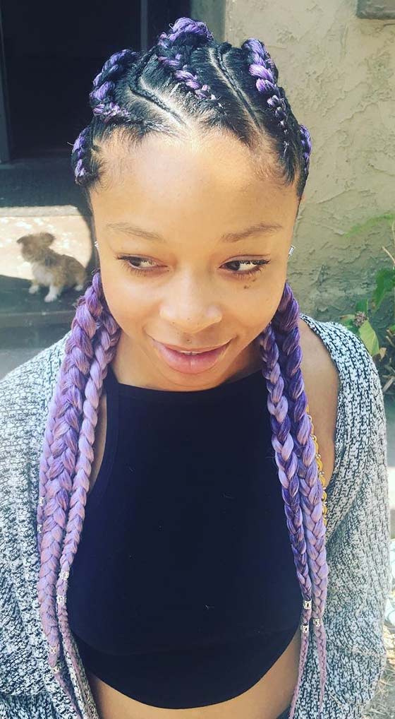 Shaded mauve curved cornrows braids hairstyle
