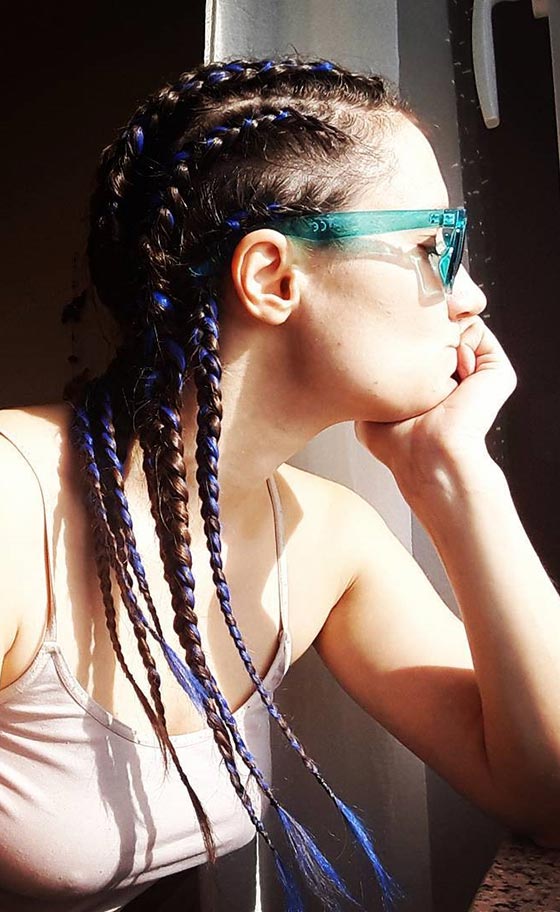 Blue accented cornrows braids hairstyle