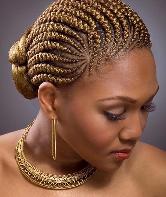 Golden blonde cornrows bun braids hairstyle