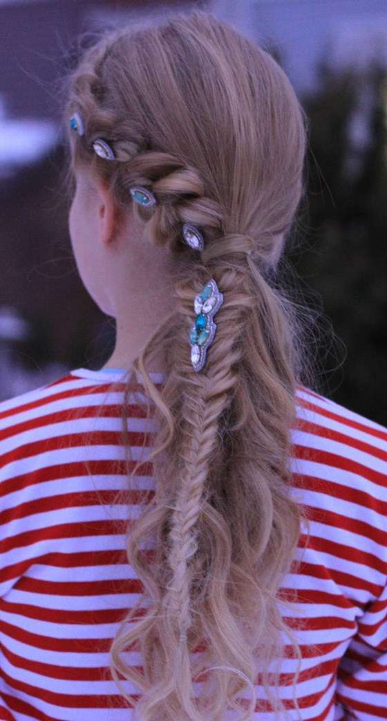 Ponytail accented with a Dutch braid for little girls