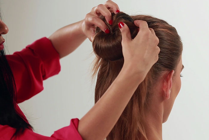 Add another rubber band to make a donut bun