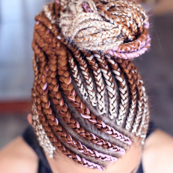 Caramel strawberry cornrows braids hairstyle