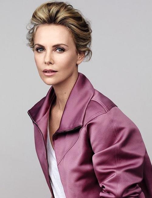 Charlize Theron's bun with a high puff hairstyle