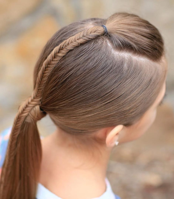 Ponytail accented with a fishtail braid for little girls