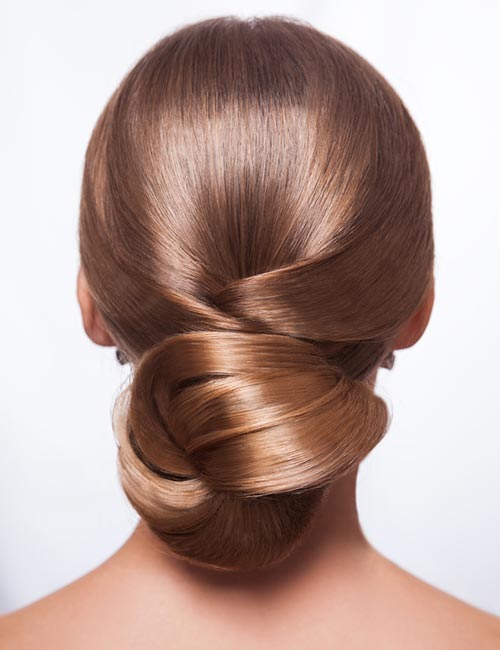 Glided bun hairstyle for long hair