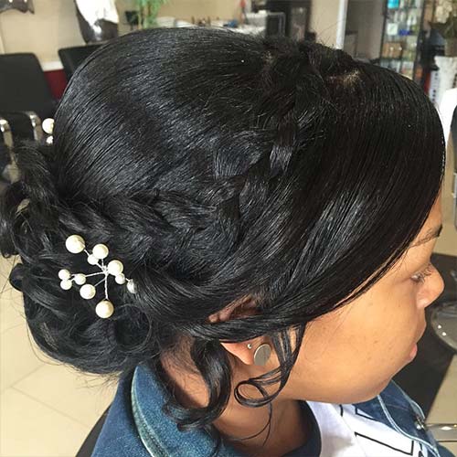 Low braided updo wedding hairstyle for black women
