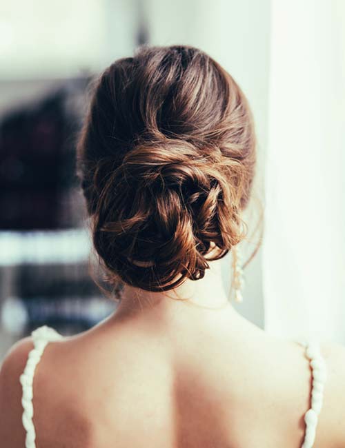 Low messy bun for long hair