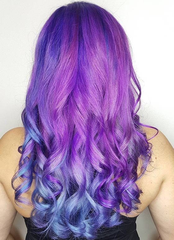 An exquisite purple mermaid ombre on long hair for a fairytale look