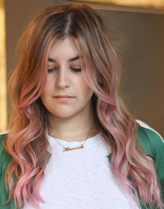 An elegant rose gold ombre color on bedhead hair