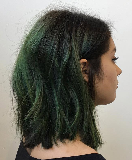 A spunky sea green ombre on messy long bob