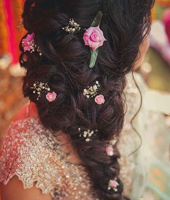 Simple floral braid Indian bridal hairstyle