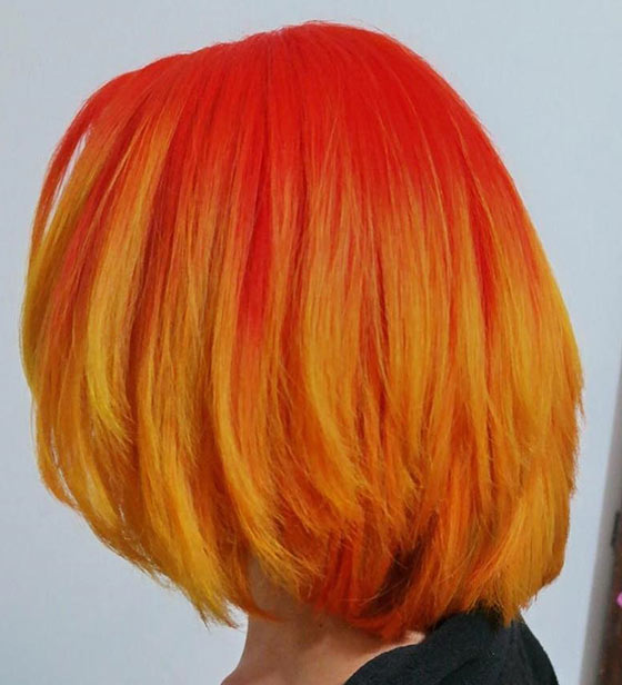 Vivid orange yellow ombre on straight bob for a bright and sunshiny look