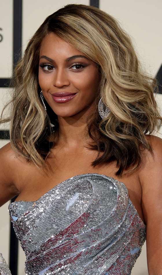 Voluminous bob cut hairstyle for dark skin tones