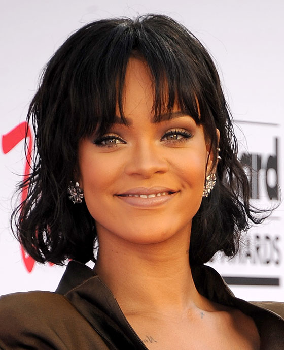 Wavy bob haircut with straight bangs for black women