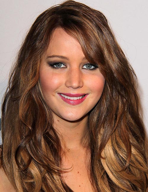 Wavy golden feathered layers hairstyles